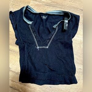 Urban outfitters, out from under.
xs black trendy top
